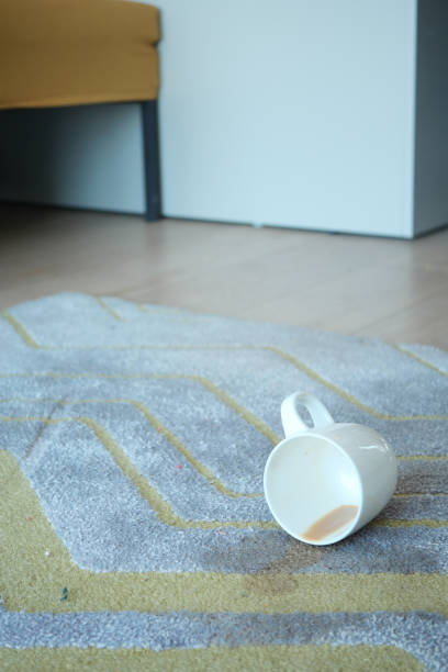 istock cup of coffee spilled on floor 1491891493