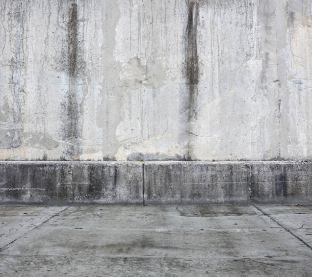 Wall And Sidewalk In An Urban Street- Background