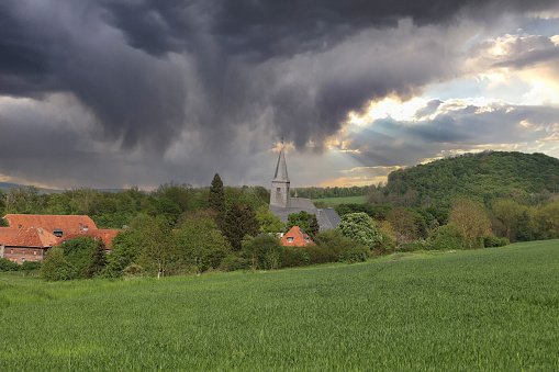 Ölinghausen monastery with dramatic sky im Sauerland
