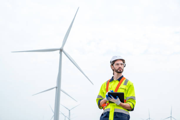 istock Technician engineer inspection work at wind turbine electricity industrial. 1491894821