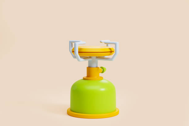 istock Green camping gas stove on empty beige background 1491895100