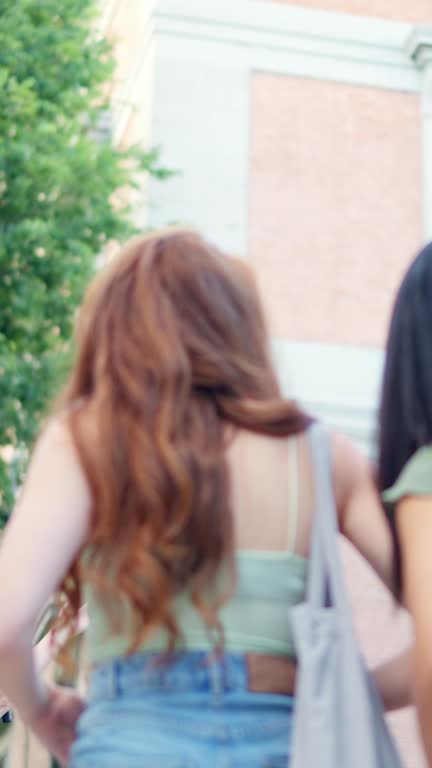 Tourist guide giving an explanation of a building to a group of people