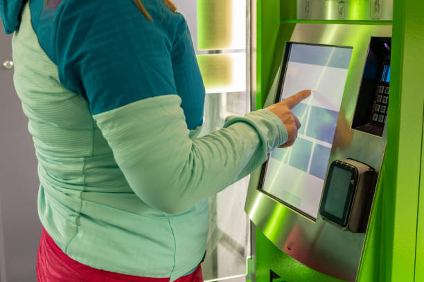 istock A young woman buys a public transport ticket in a vending machine, urban and agglomeration transport 1491902484