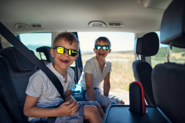 istock Happy little boys aged 7 travelling by car 1491911672
