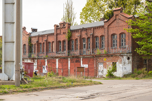 Imperial Shipyard, Gdansk, Poland - 01 May 2019: Abandoned destroyed building of the former fire station.