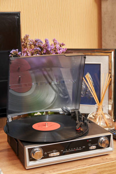 istock vinyl player with a record in a modern house. near flowers and aroma diffuser 1491970911