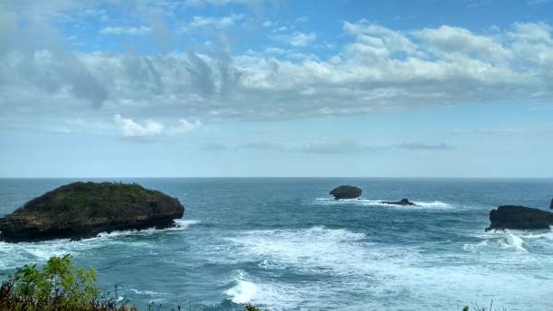 istock Beautiful landscape seascape aerial view Srau beach in Pacitan East Java Indonesia 1491974609