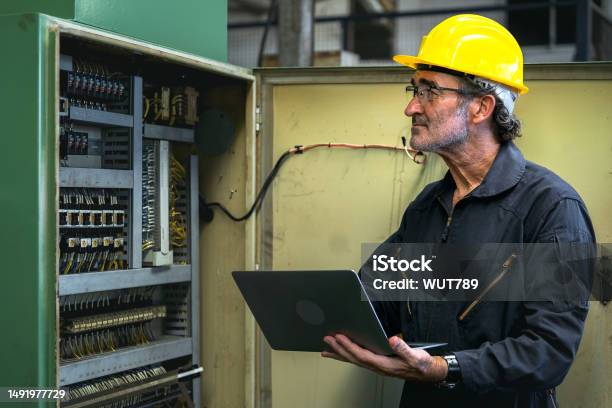Engineer Control Panel Electrical Engineer Team Working Front Control Panel An Electrical ...