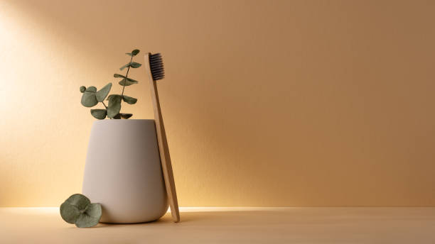 istock Eco-friendly bamboo toothbrush in a white glass 1491986864