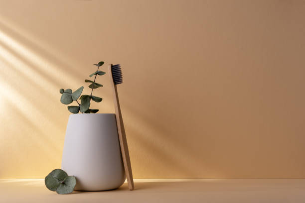 istock Eco-friendly bamboo toothbrush in a white glass 1491986892
