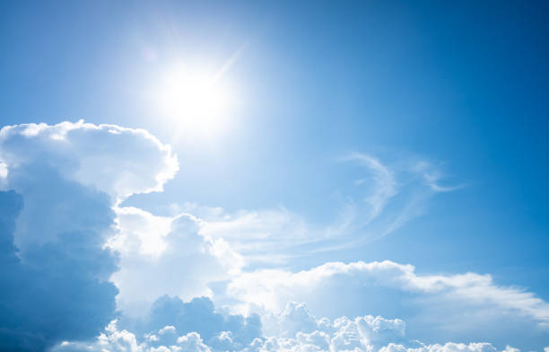 istock Beautiful blue clear sky with white cloud and sunshine background. 1491994114