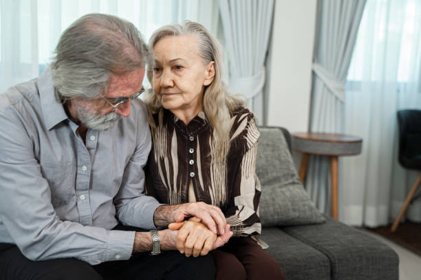 istock Mature couple holding hands. 1491995477