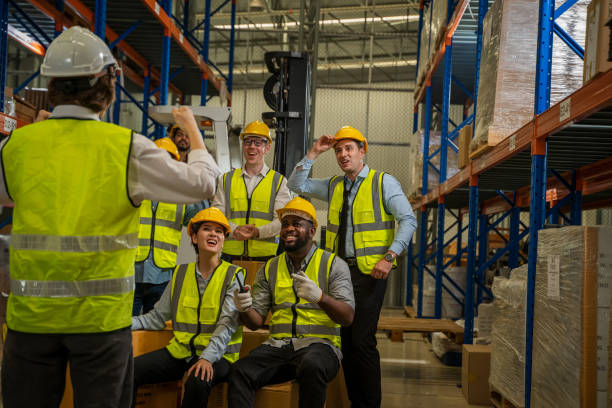 istock Successful warehouse team smiling happily,Industrial and industrial workers concept. 1491999560