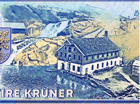 Production building by the lake from money - kroner