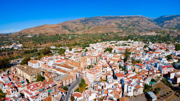 istock Orgiva town aerial panoramic view in Alpujarras, Spain 1492004584