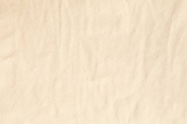 istock Brown kraft crumpled paper texture 1492006560