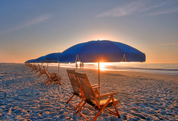 istock Beach Sunrise with umbrells-Hilton Head, South Carolina 1492006719
