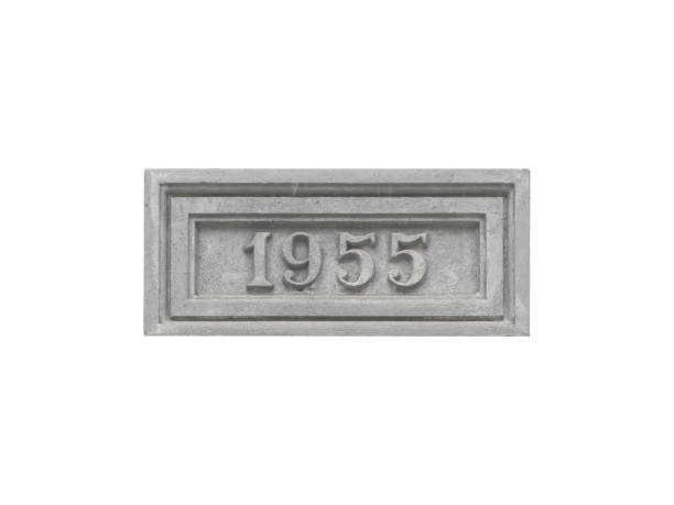 istock Concrete monumental sign with the inscription 1955 isolated on a white background. 1492009372