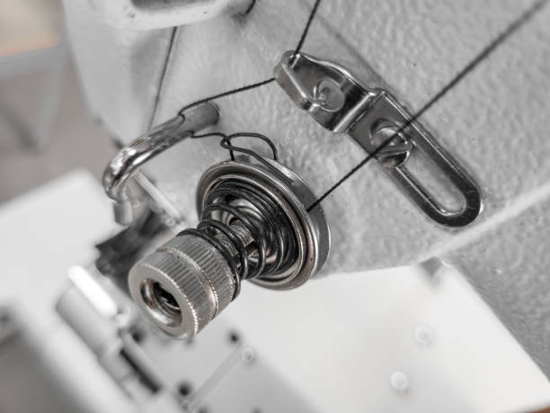 istock Element of sewing machine, stretching mechanism for rope, close-up macro. 1492009454