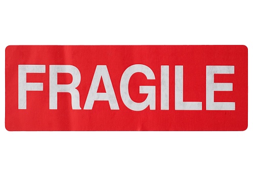 fragile warning sign label tag isolated over white background