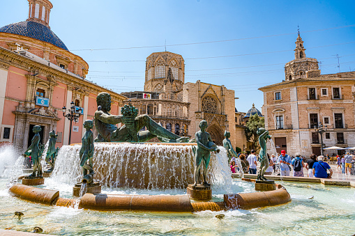 May 20, 2023. Plaza de la Virgen water fountain  in Valancia-Spain visited by tourists