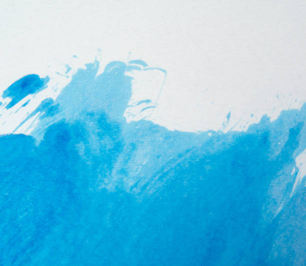 istock Blue paint and splash and white background, copy space above. 1492018792