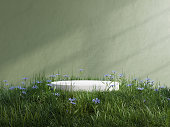 White podium in meadow for product presentation and on transparent background.3d rendering