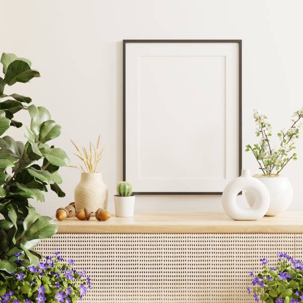 istock Poster mockup with vertical black frame in white wall interior background. 1492021036