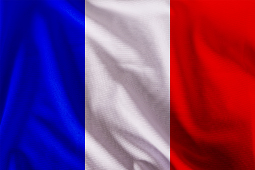 Waving and closeup French flag background .France