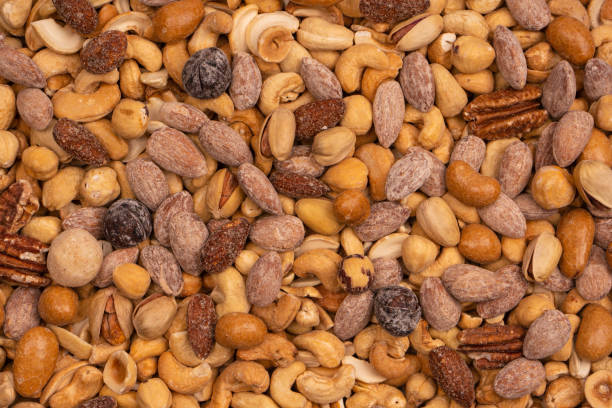istock A group of almonds, pistachios, walnuts, macadamia, cashews. 1492024627