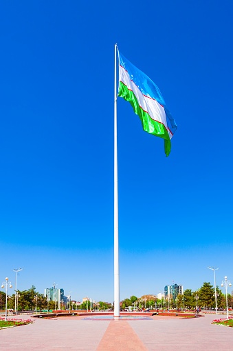 National Flag of Uzbekistan at the Bunyodkor or Friendship of Peoples square in Tashkent city, Uzbekistan