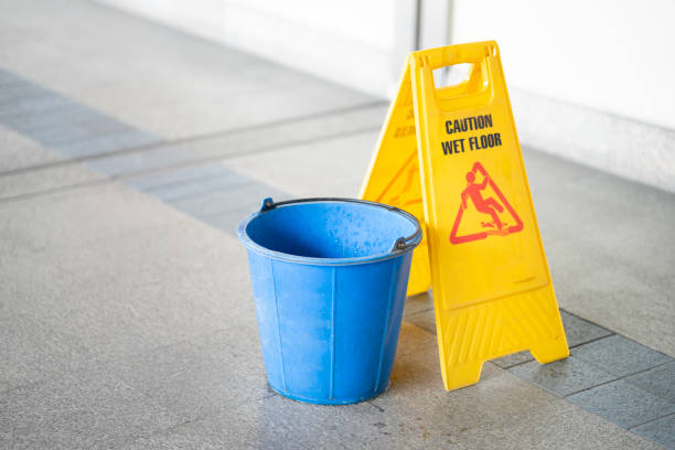 istock Warning sign for wet floor, caution and dangerous 1492027106