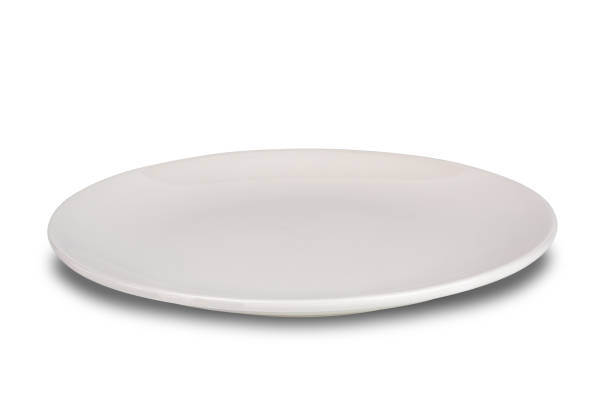 istock Closeup view of single empty white shallow seramic plate isolated on white background. 1492030110