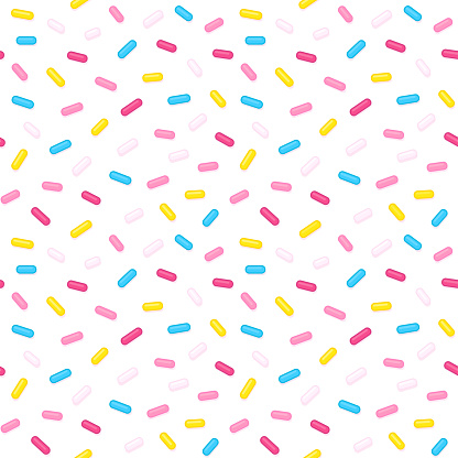 Bright sugar sprinkles seamless pattern. Donut glaze or birthday cake decoration on white background. Fun cartoon vector texture.