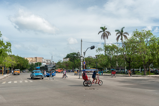Havana, Cuba - October 22, 2017: Havana Cityscape with Local Vehicles, Architecture and People. Cuba.