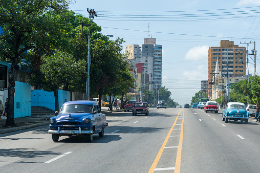 Havana, Cuba - October 23, 2017: Havana Cityscape with Old Cars and Architecture in Background.