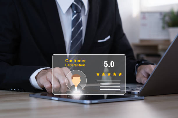 istock Man hand using computer to Customer Satisfaction Survey concept, 5-star satisfaction, service experience rating online application. customer evaluation product service quality, satisfaction feedback review, good quality most. 1492033970