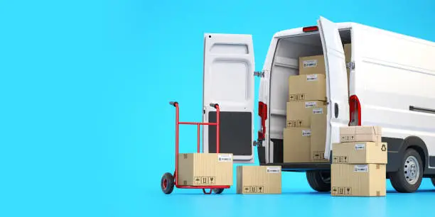 Photo of Fast espress delivery concept. Rear view of delivery van with cardboard boxes on blue background.