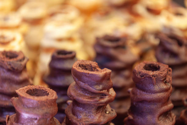A French spit cake consisting of layers of batter placed, one at a time, on a rotating spit cooked rotisserie-style.