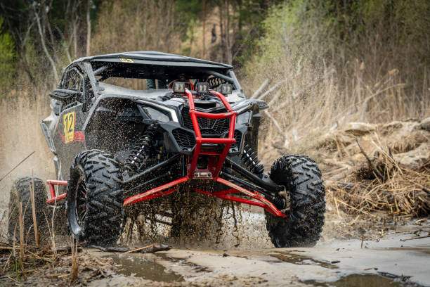 istock ATV/UTV/4x4 off-road vehicle in muddy water 1492036534