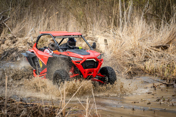 istock Cool view on hard ride UTV in muddy water 1492036538