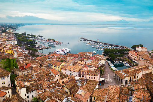 Desenzano del Garda port aerial panoramic view. Desenzano is a town on the shore of Lake Garda in the Brescia province in Lombardy, Italy.