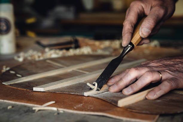 istock Carving Guitar Braces in the Workshop 1492043219