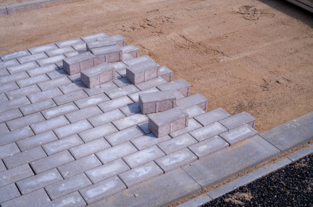 istock Paving stones are laid for a new sidewalk 1492044972