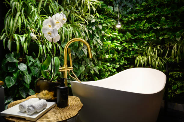 istock Bath in modern beauty salon, luxury bathroom interior in spa with vertical garden 1492052591