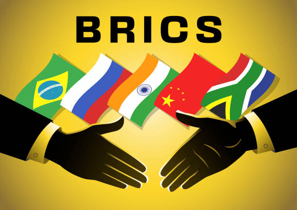 flaggen der brics-staaten auf gelbem hintergrund. - schwellenländer stock-grafiken, -clipart, -cartoons und -symbole