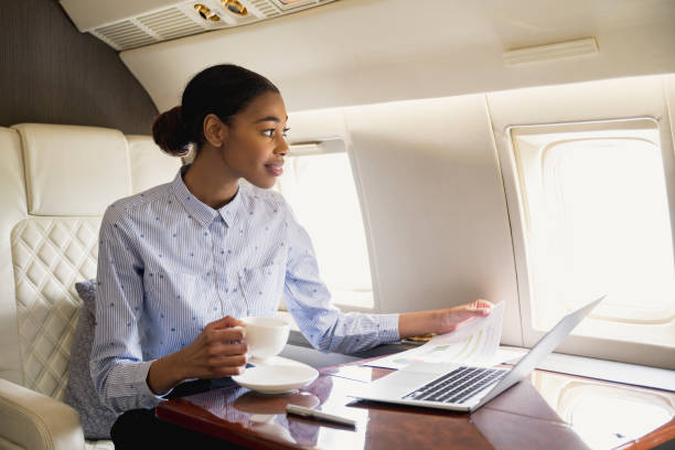 istock Black executive enjoying luxurious air travel 1492066094