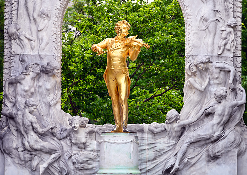 Johann Strauss golden monument in Stadtpark Vienna Austria