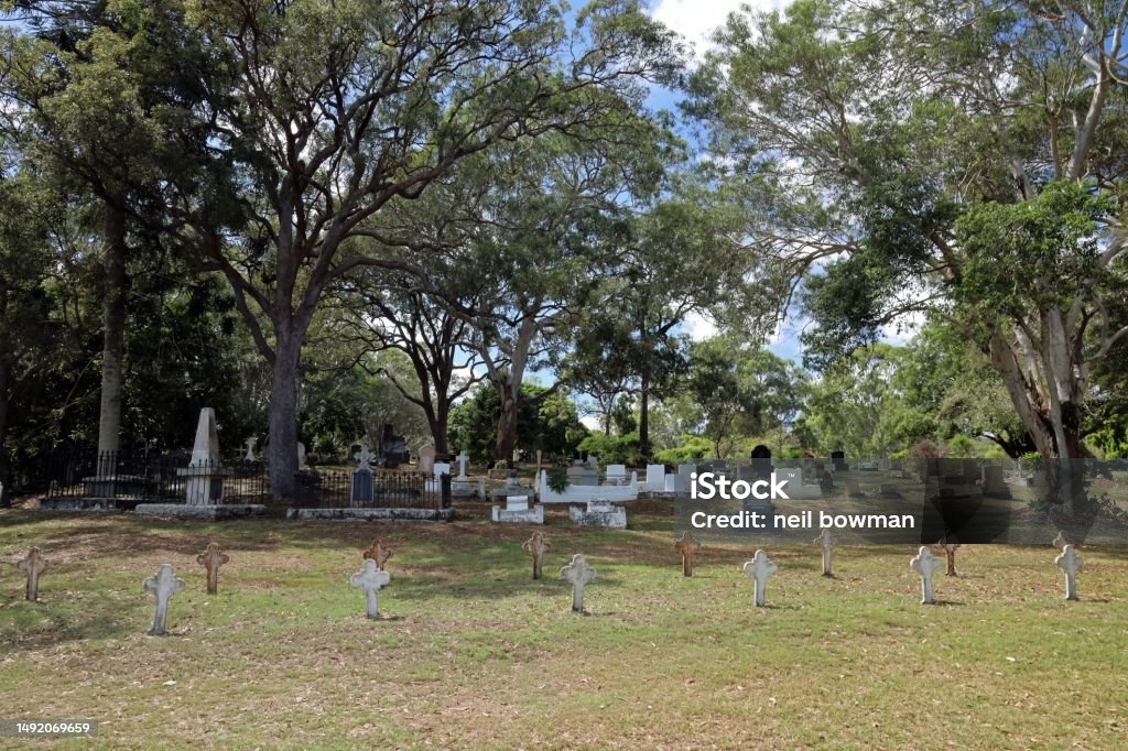 cemetery on the island Cemetery with many graves from 19th century plague outbreak

North Stradbroke Island, Queensland, Australia.     March Australia Stock Photo