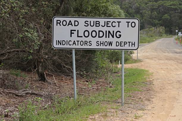istock sign for flooding on road 1492069723